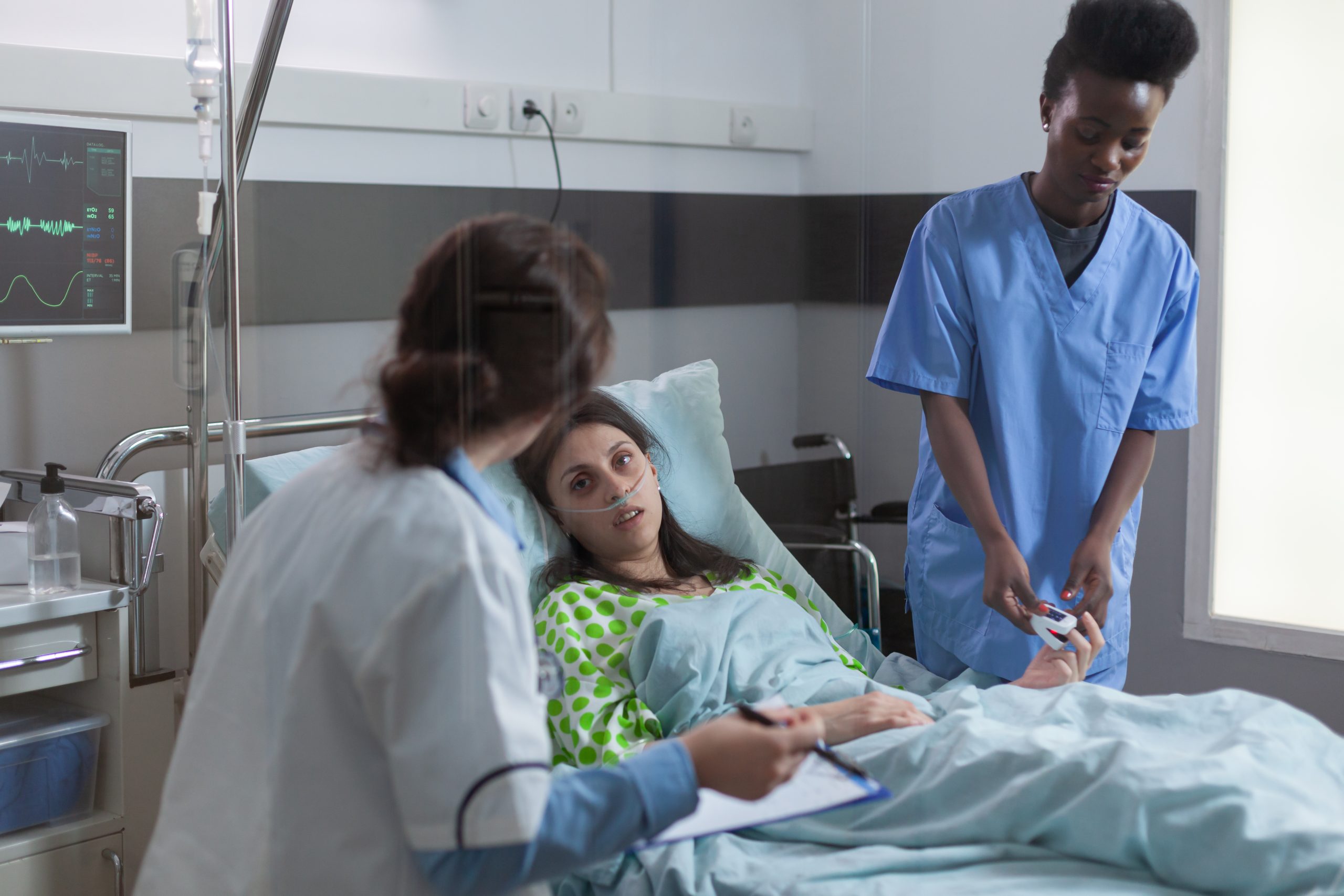 Healthcare assistant supporting a patient during recovery